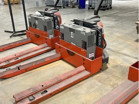Collection of warehouse pallet jacks