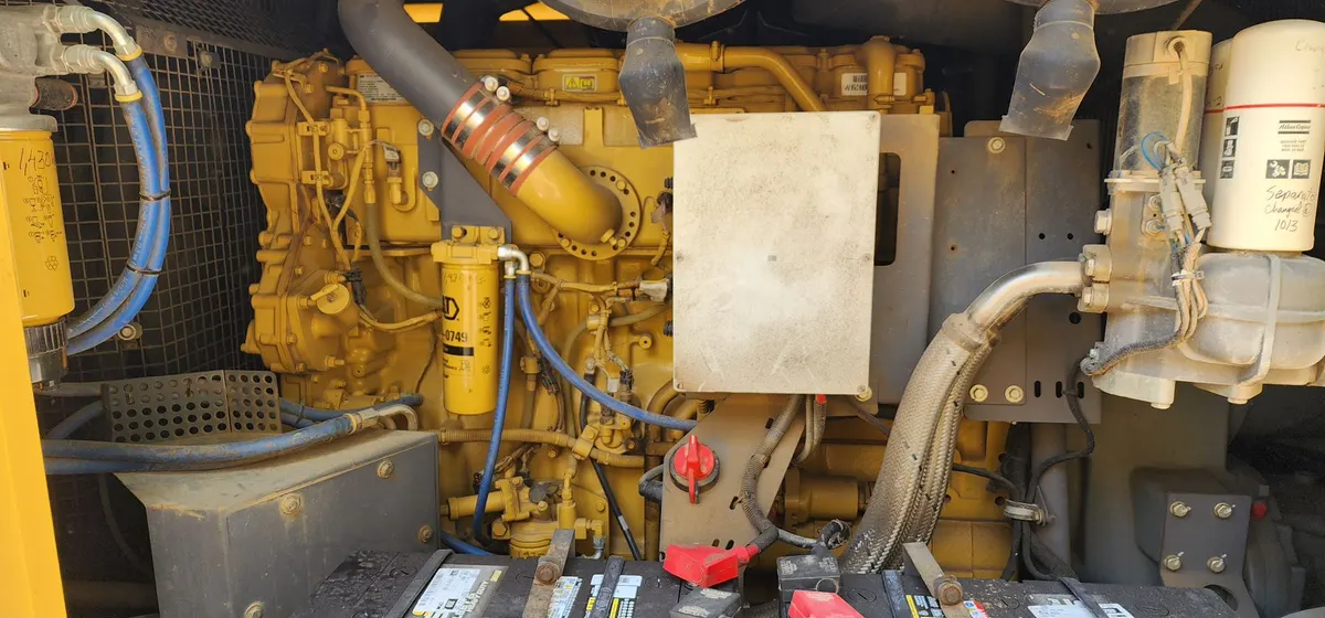 Atlas Copco XRVS 1550 CD7 portable air compressor - Cat diesel engine interior view