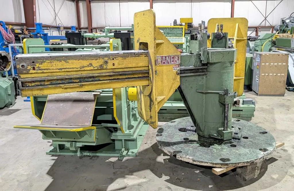 Paxson slitting line - Braner two-arm exit turnstile