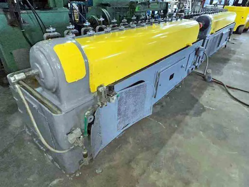 Tishken rollformer - forming section drive end with yellow guarding